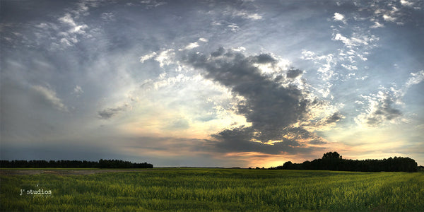Summer Sunset is an image of the big Alberta Sky setting on Heritage Valley in Edmonton. Panorama photography.