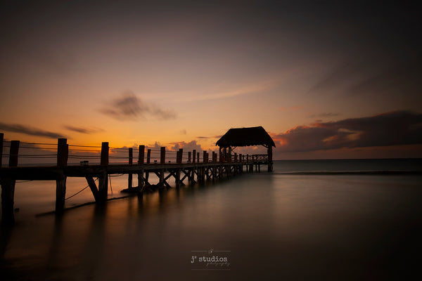 Art print of a Gazebo on a wooden pier in The Fives Azuls Beach Resort in Playa Del Carmen, Mexico. Peaceful waters of Caribbean Sea. Print by artists Larry Jang.