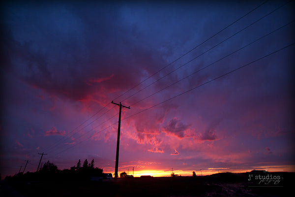 Sunset on the Prairies is a sunset after a particularly dramatic and violent summer thunderstorm. Alberta photography.