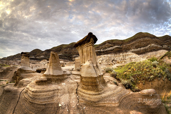 The Hoodoos is an image of the iconic rock formations sitting in Drumheller, Alberta. Badland landscape photography.