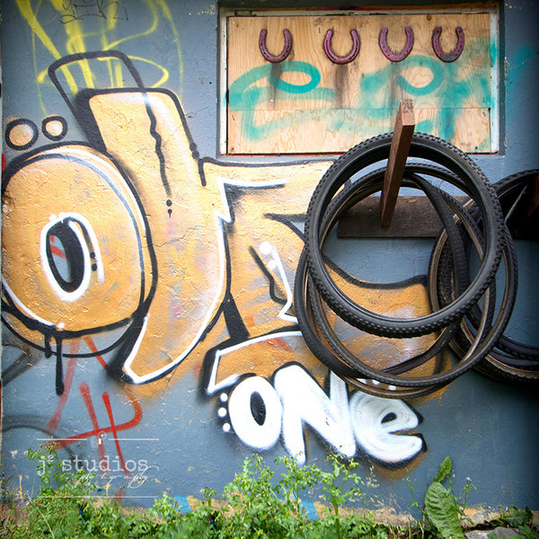 Tired Art is a graffiti themed image about bike tires. Urban Photography.