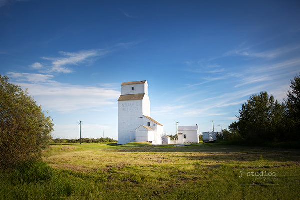 Photograph of the Krause Milling Company Grain Elevator in the Hamlet of Radway, Alberta. Historical places photography.