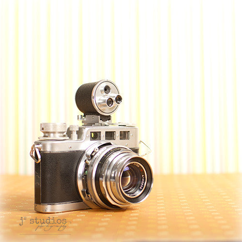 Vintage Camera #15 is an art print of the Diax IIa Rangefinder Film Camera made by W Voss.