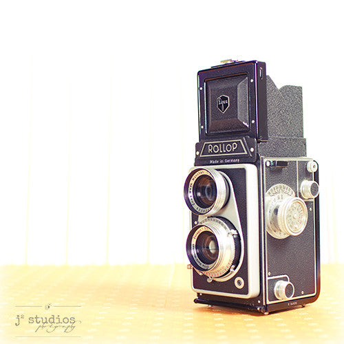 Vintage Camera #8 is an art print of the 1956 Rollop twin lens reflex (tlr) medium format camera from Germany.