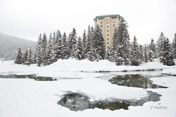 Image of Chateau Lake Louise in romantic winter wonderland of Banff. Rocky Mountain Photography.