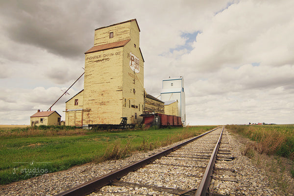 Your Heritage Will Bring You Home (No Words) is a sentimental themed image of Mossleigh's grain elevators. Alberta Photography.