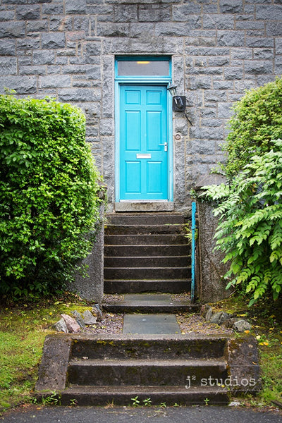 Art print of a baby blue door in a charming Scottish village. Doors and Windows Photography of the world.
